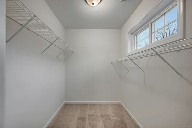 a view of a room with racks on the wall