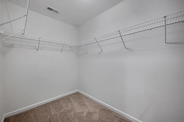 a view of a room with racks on the wall