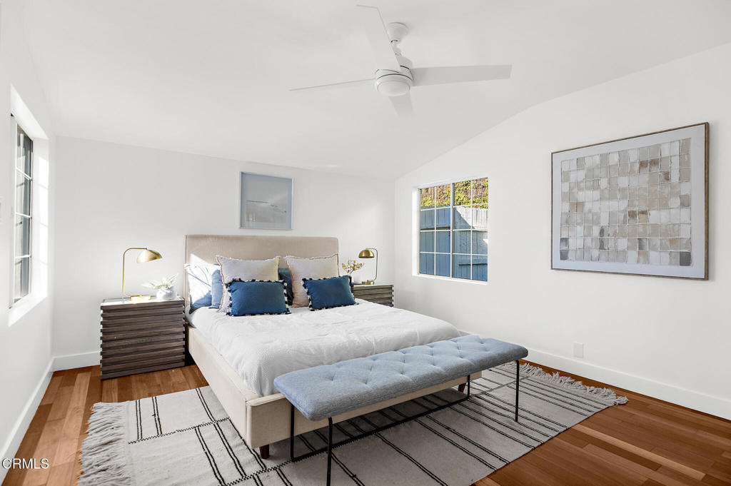 1010 Pepperhill Road Pasadena, CA 91107 - Photo 18 of 35 a bedroom with a bed and a painting on the wall