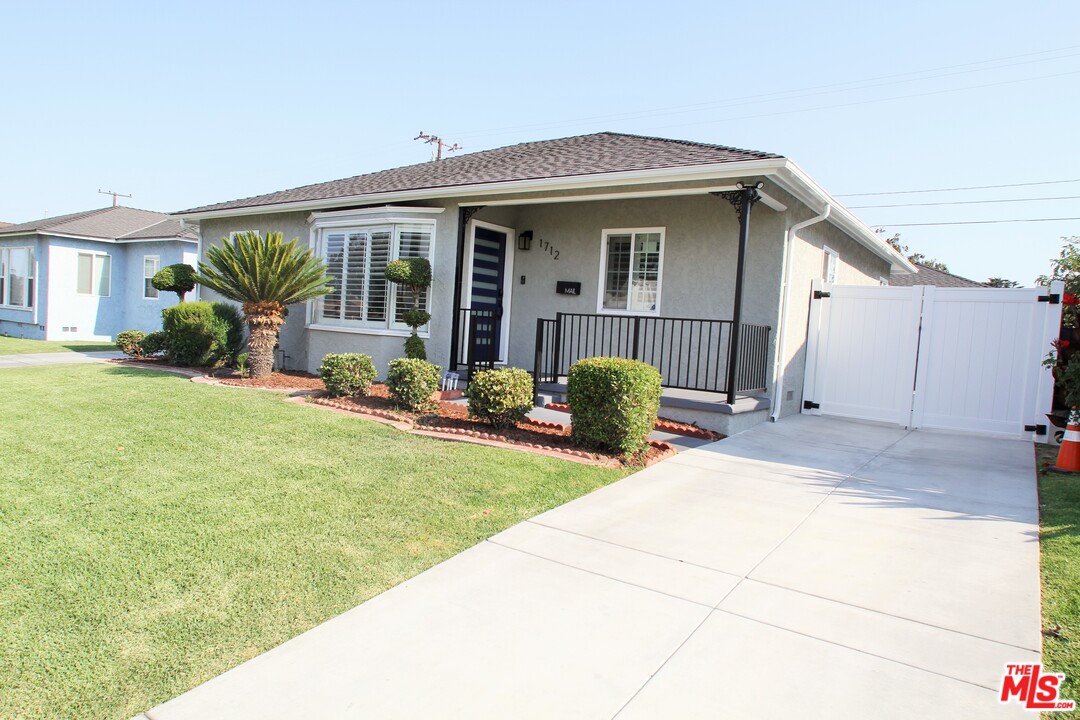 1712 West Poplar Street Compton, CA 90220 - Photo 41 of 41 a view of house with outdoor seating area