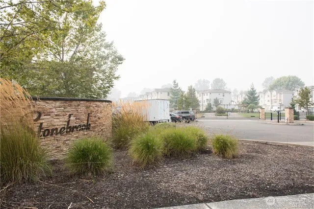 a view of a street with of houses