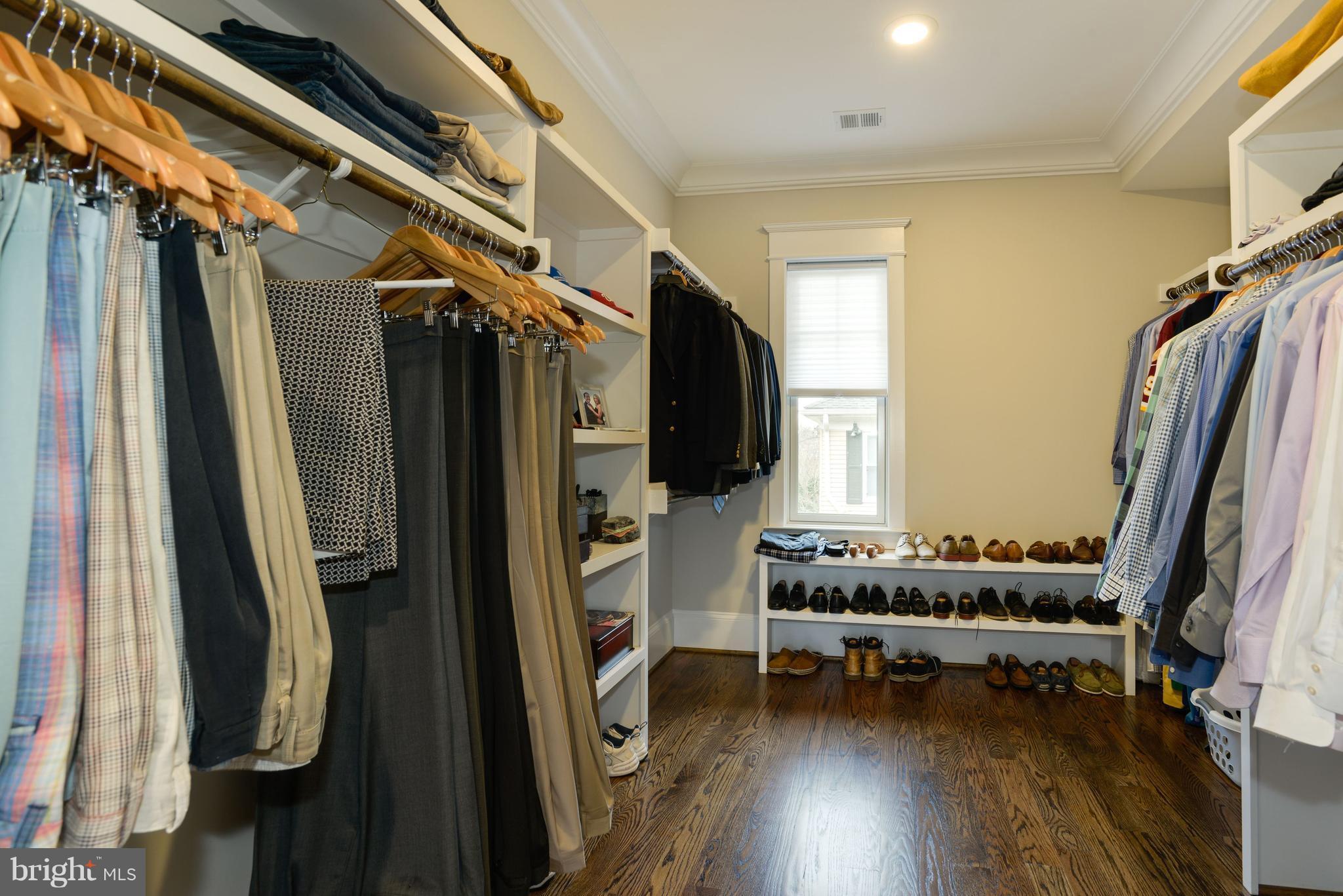 5836 MacArthur Boulevard Northwest Washington, DC 20016 - Photo 15 of 29 a view of walk in closet with clothes and shoes