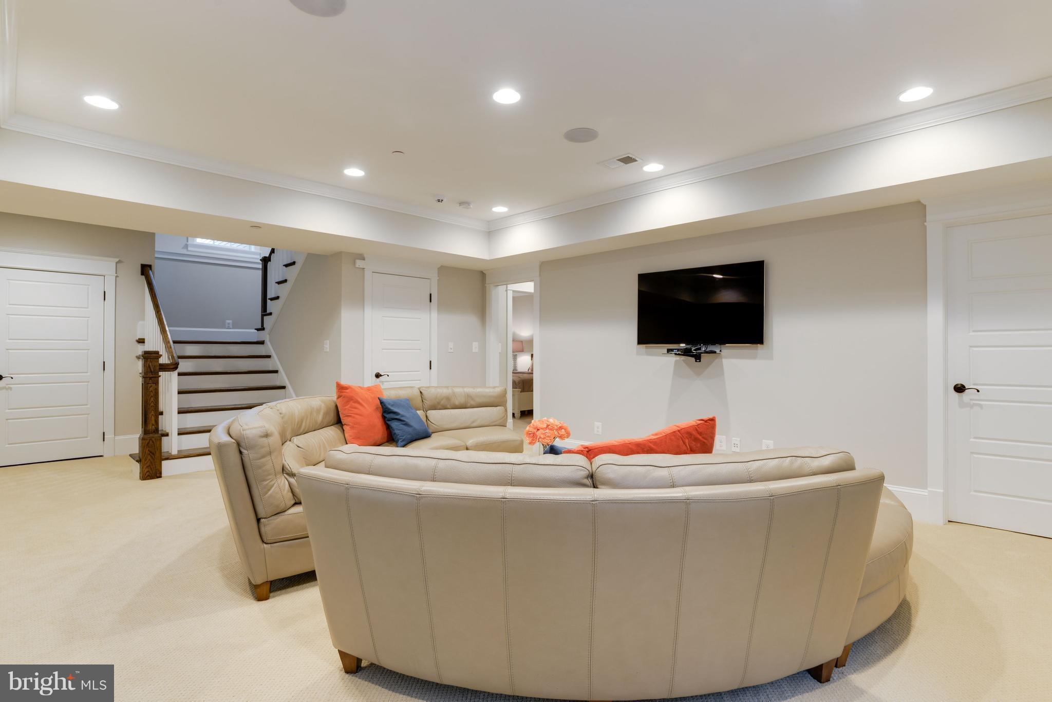 5836 MacArthur Boulevard Northwest Washington, DC 20016 - Photo 27 of 29 a room with furniture and flat screen tv