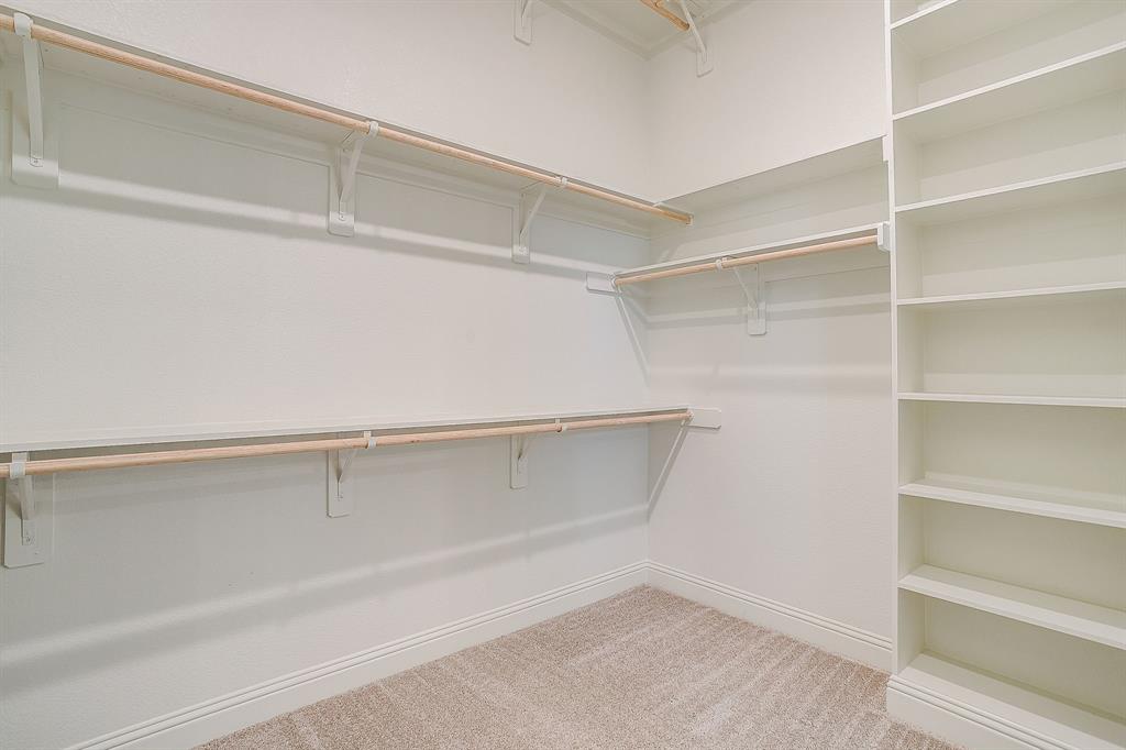 324 Slimp Bluff Azle, TX 76020 - Photo 22 of 35 a view of an empty walk in closet