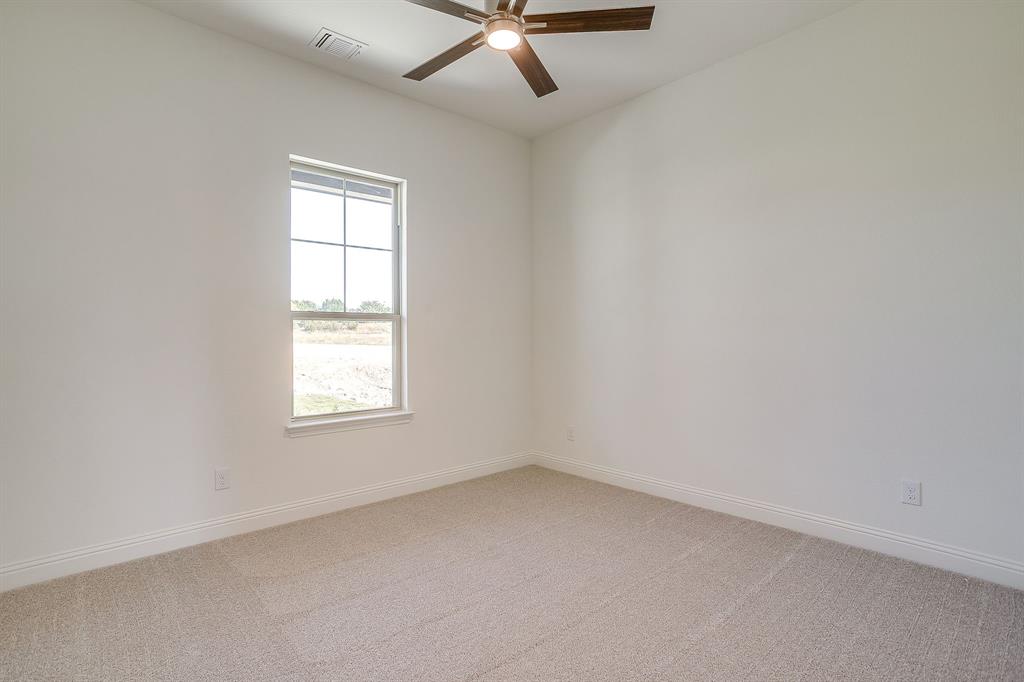 324 Slimp Bluff Azle, TX 76020 - Photo 23 of 35 an empty room with a window