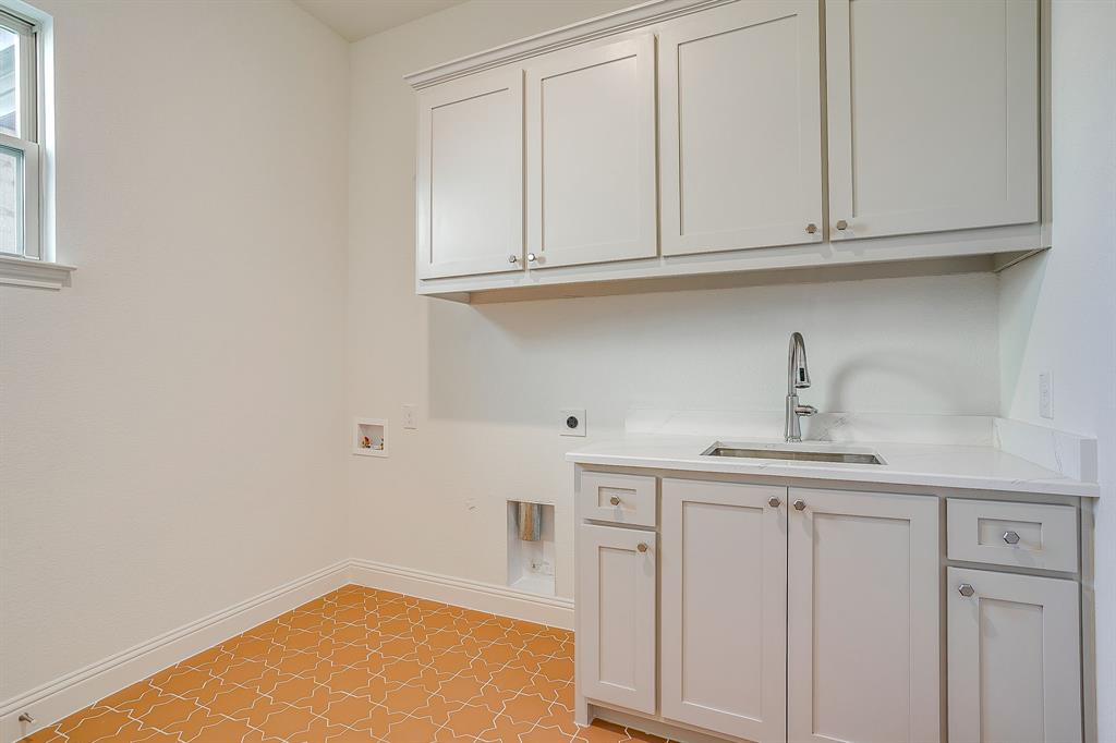 324 Slimp Bluff Azle, TX 76020 - Photo 30 of 35 a kitchen with white cabinets