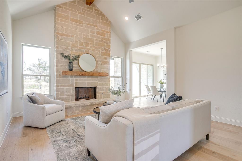 324 Slimp Bluff Azle, TX 76020 - Photo 4 of 35 a living room with furniture and a fireplace