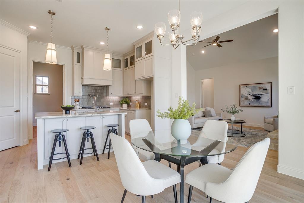 324 Slimp Bluff Azle, TX 76020 - Photo 9 of 35 a view of a dining room with furniture and wooden floor
