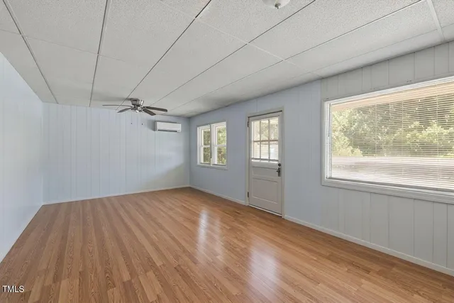a view of a storage & utility room with wooden floor