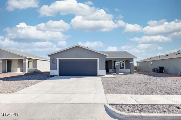 a front view of a house with yard