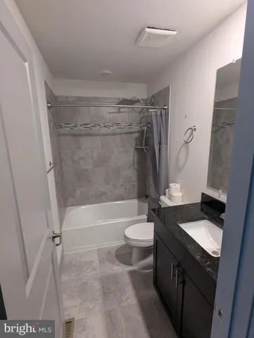 a view of balcony with wooden floor