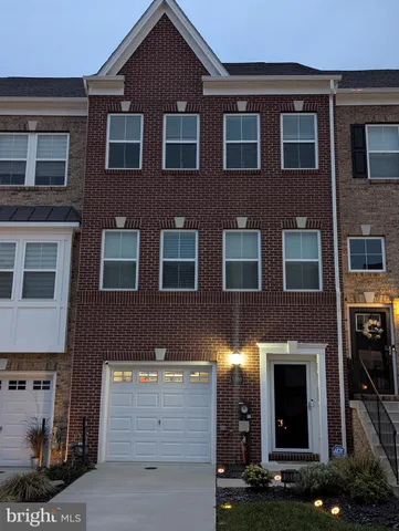 a front view of a building with yard