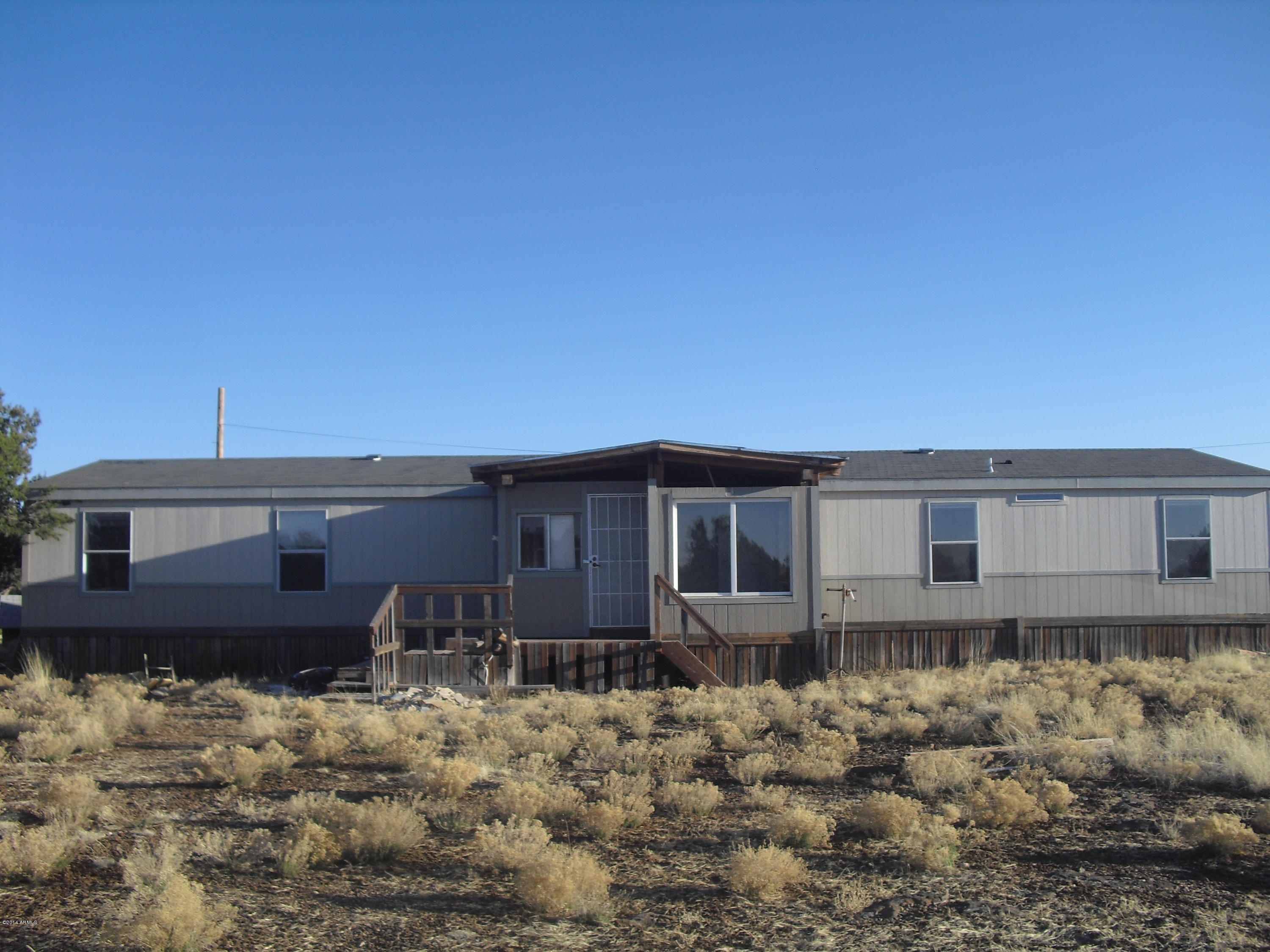 2041 Supancheck Road Show Low, AZ 85901 - Photo 1 of 11 FRONT OF HOME