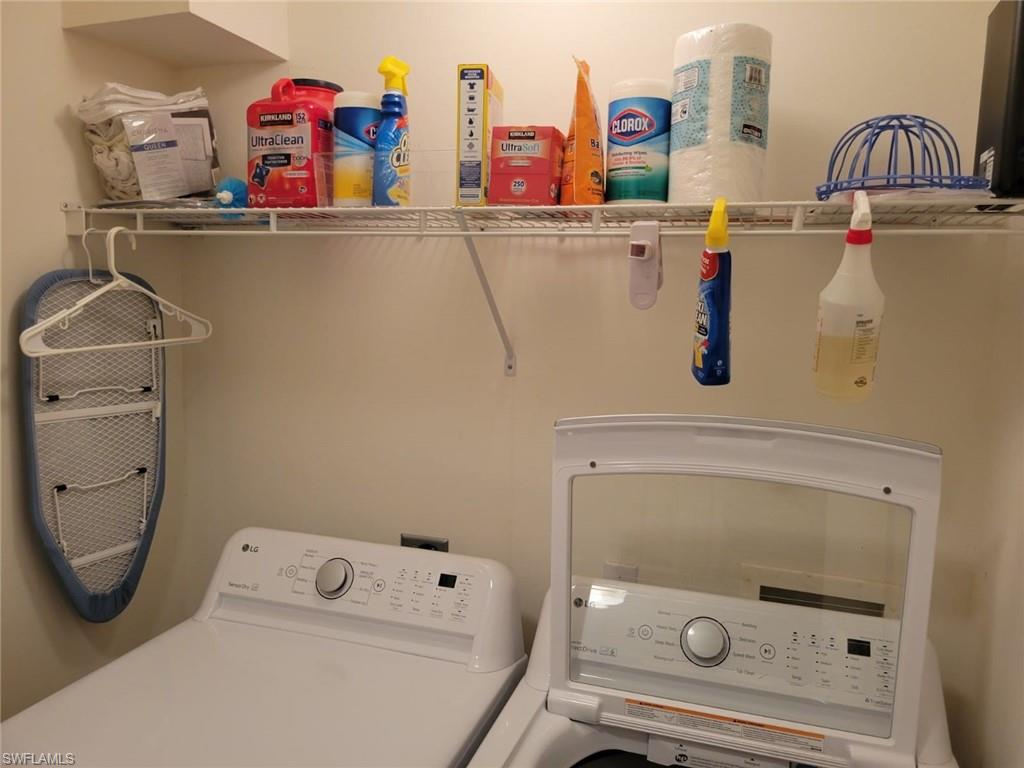 993 Hampton Circle, Unit 122 Naples, FL 34105 - Photo 26 of 26 a utility room with dryer and washer