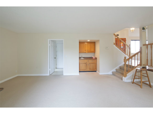 6502 McAbee Road San Jose, CA 95120 - Photo 14 of 25 a view of an empty room and a kitchen