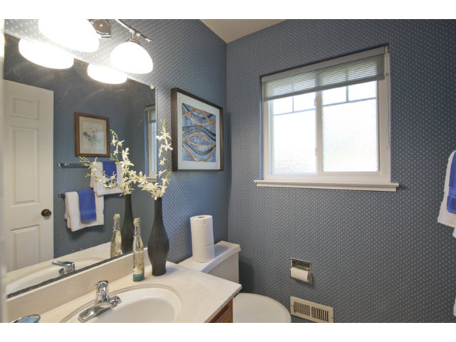 6502 McAbee Road San Jose, CA 95120 - Photo 15 of 25 a bathroom with a sink a toilet and mirror