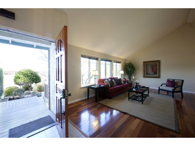 6502 McAbee Road San Jose, CA 95120 - Photo 19 of 25 a living room with furniture and a wooden floor