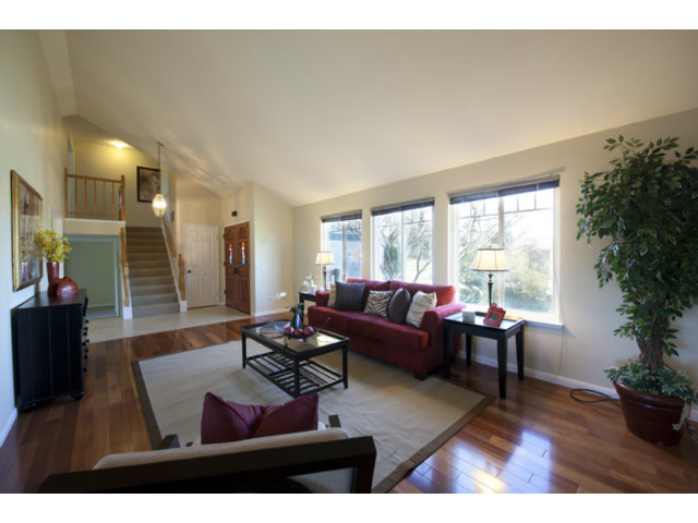 6502 McAbee Road San Jose, CA 95120 - Photo 2 of 25 a living room with furniture and a potted plant