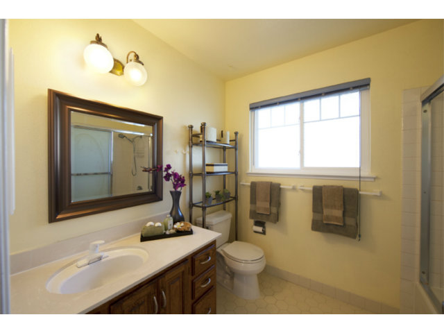 6502 McAbee Road San Jose, CA 95120 - Photo 24 of 25 a bathroom with a sink mirror and toilet