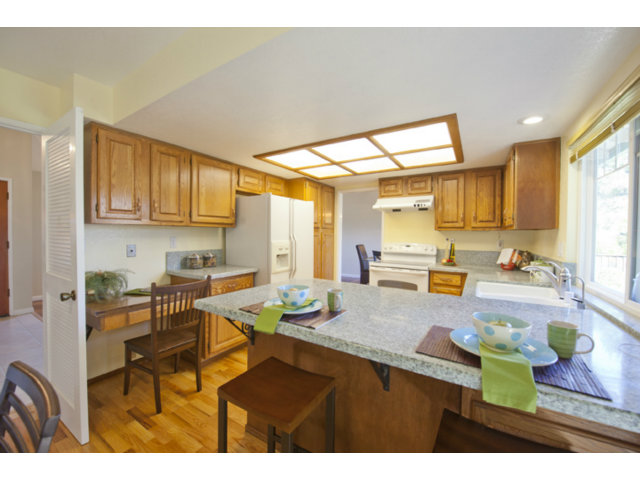 6502 McAbee Road San Jose, CA 95120 - Photo 3 of 25 a kitchen with a sink and cabinets
