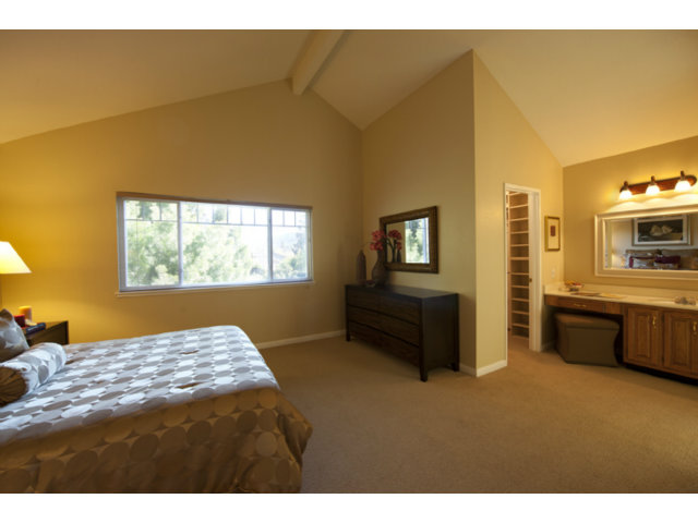 6502 McAbee Road San Jose, CA 95120 - Photo 7 of 25 a bedroom with a bed and a view of kitchen