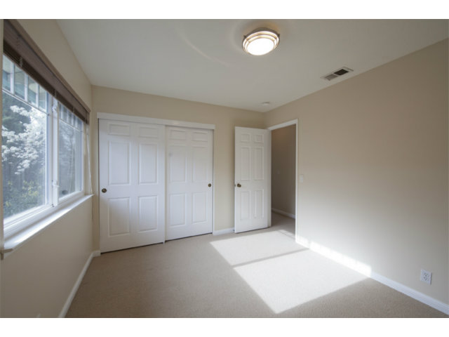 6502 McAbee Road San Jose, CA 95120 - Photo 9 of 25 a view of an empty room with a window