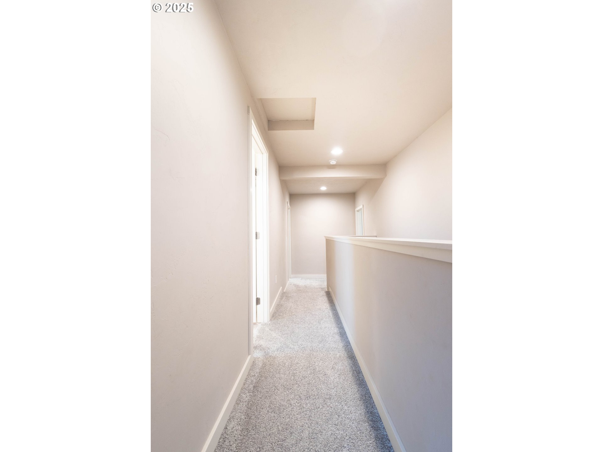69717 Antles Road Cove, OR 97824 - Photo 22 of 38 a view of a hallway with white walls
