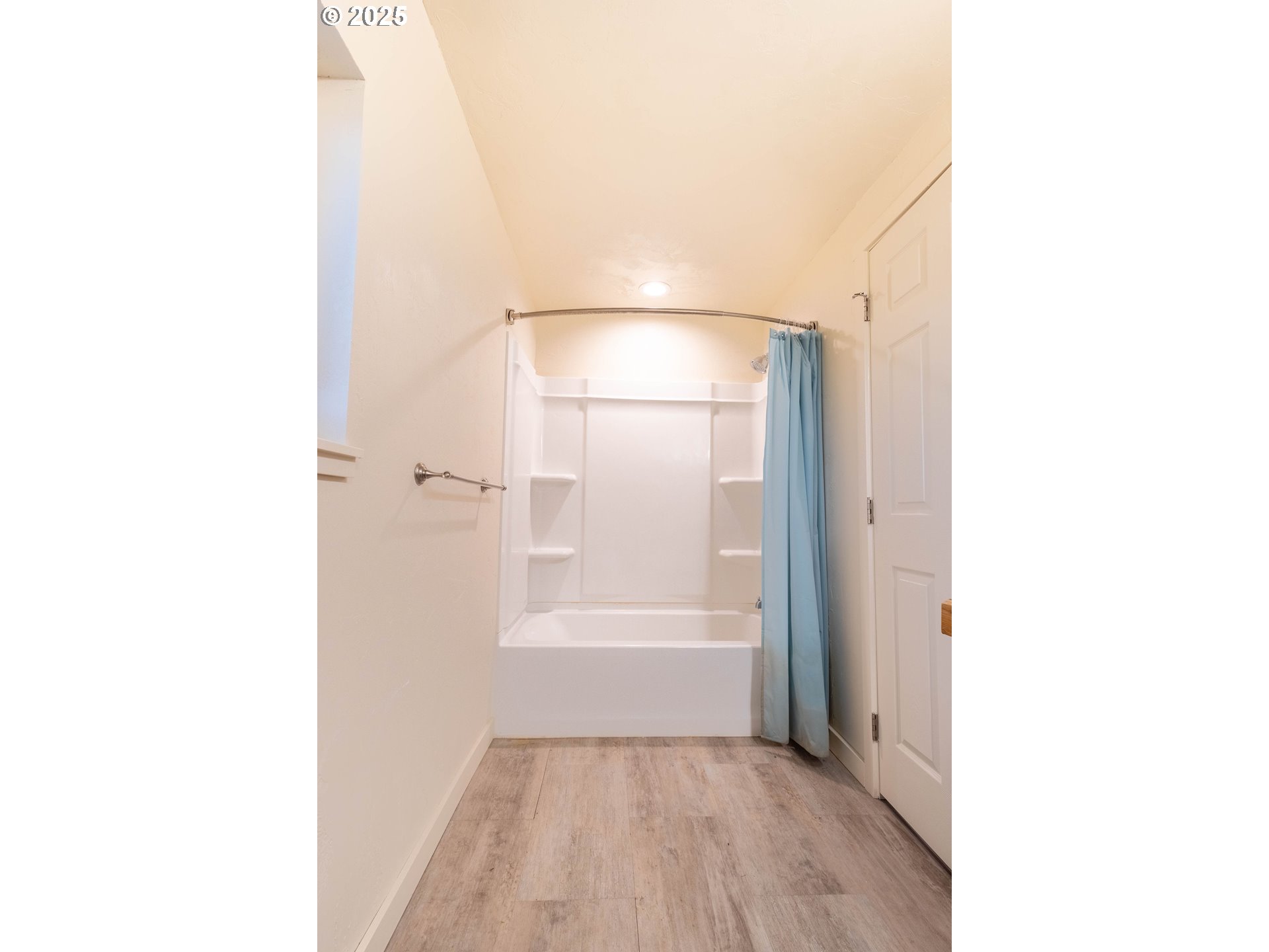 69717 Antles Road Cove, OR 97824 - Photo 25 of 38 a bathroom with a bathtub and a shower