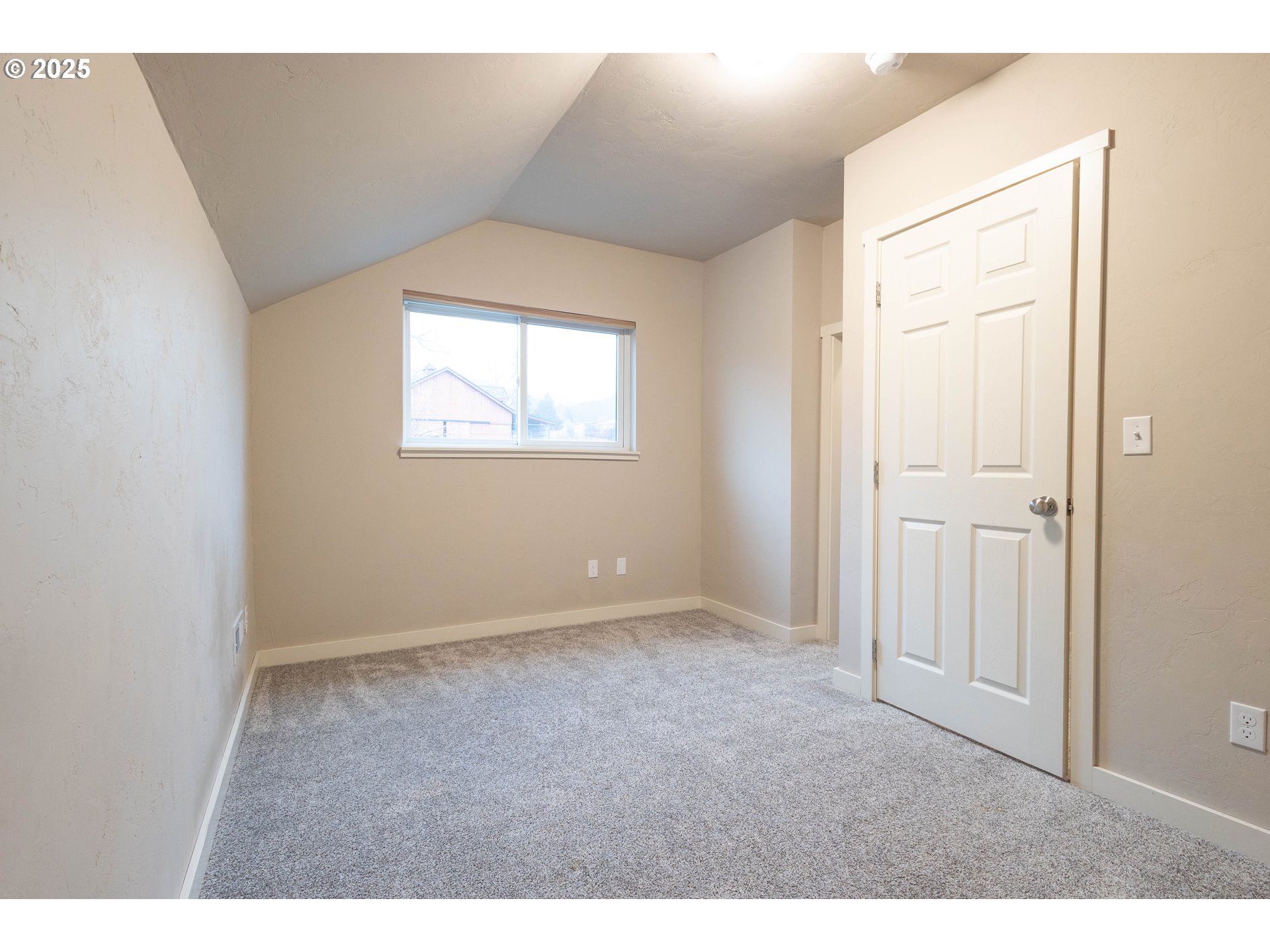 69717 Antles Road Cove, OR 97824 - Photo 26 of 38 a view of an empty room with a window