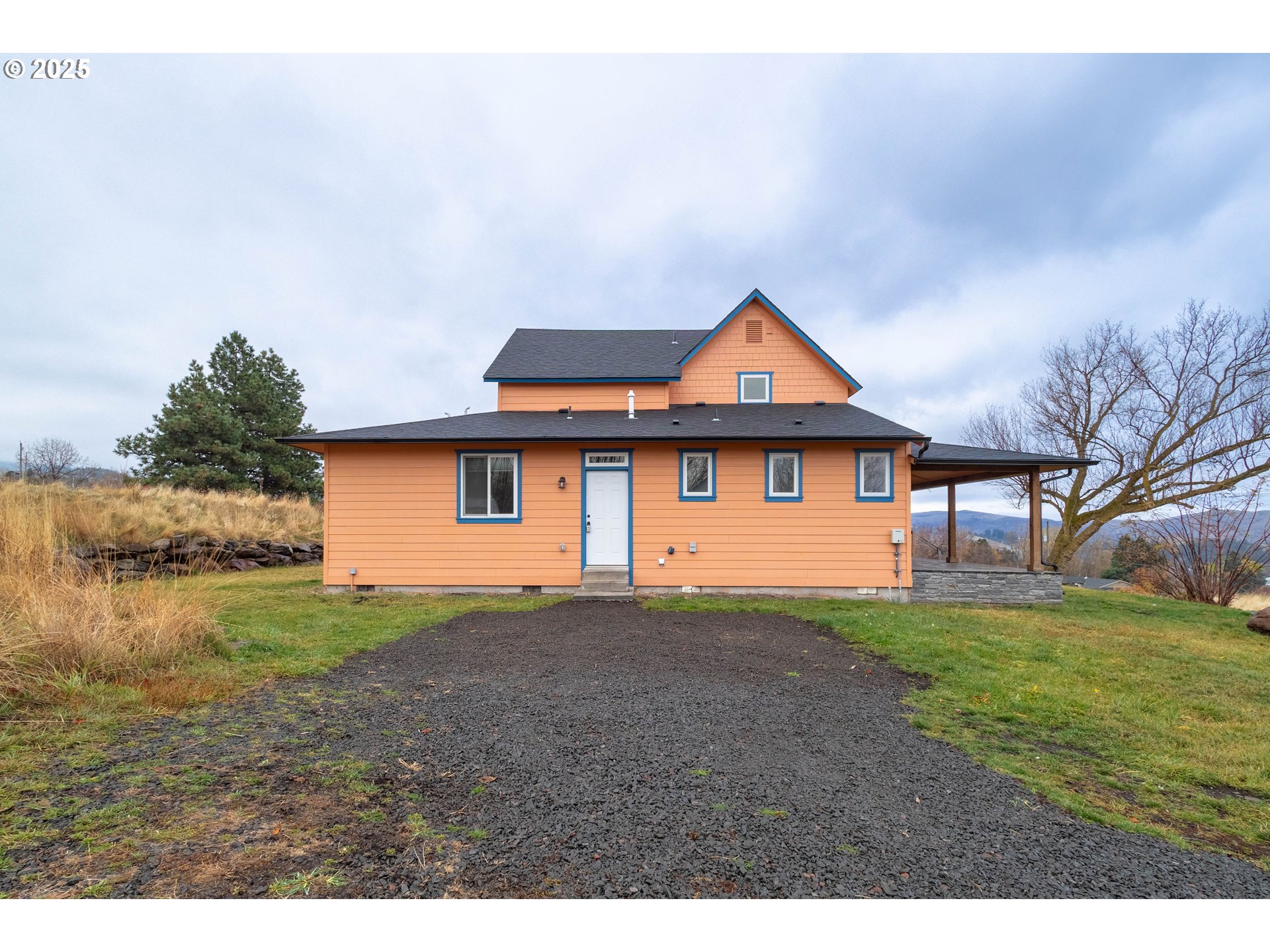 69717 Antles Road Cove, OR 97824 - Photo 33 of 38 a front view of a house with a yard