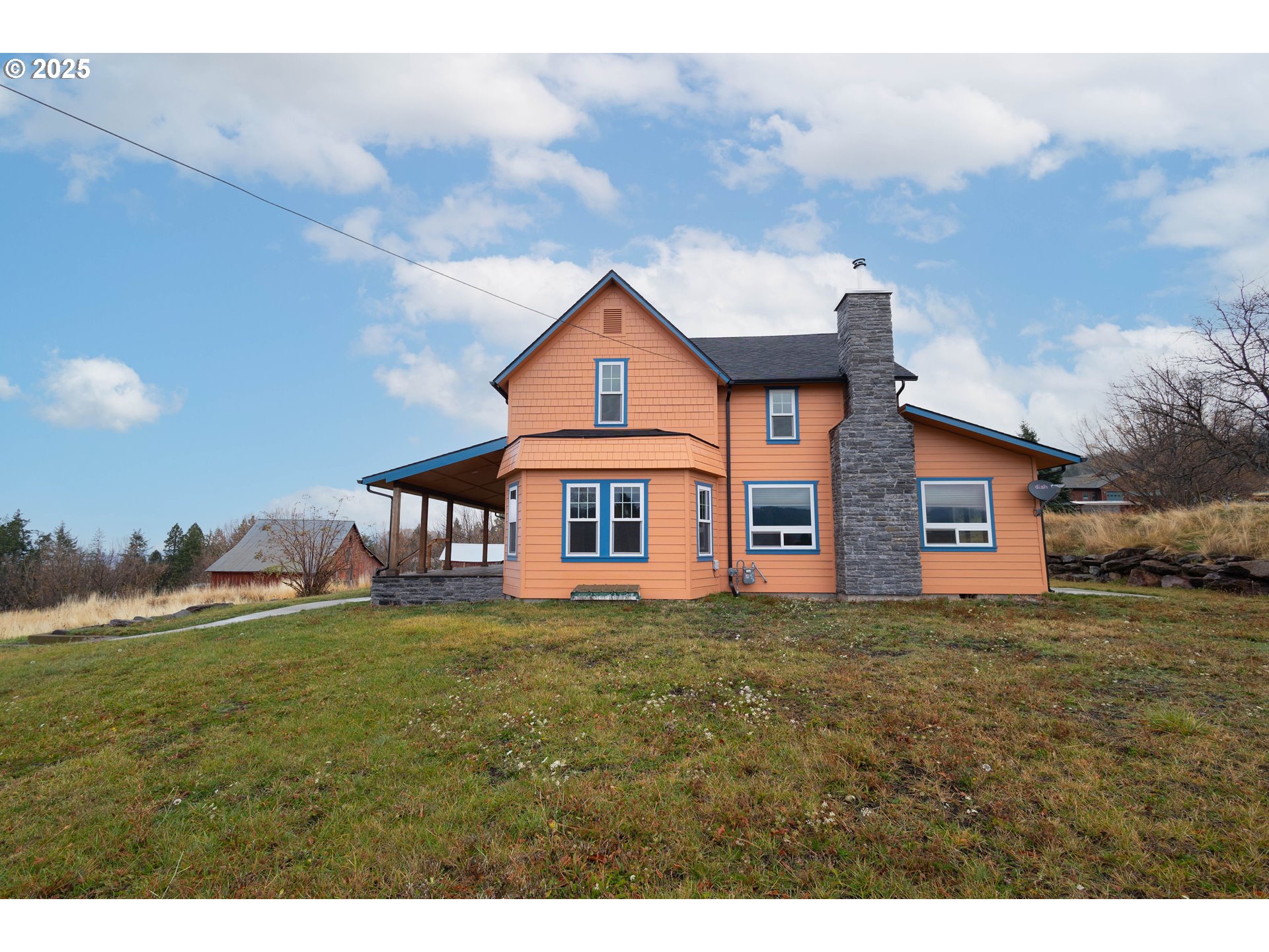 69717 Antles Road Cove, OR 97824 - Photo 35 of 38 a front view of a house with a yard