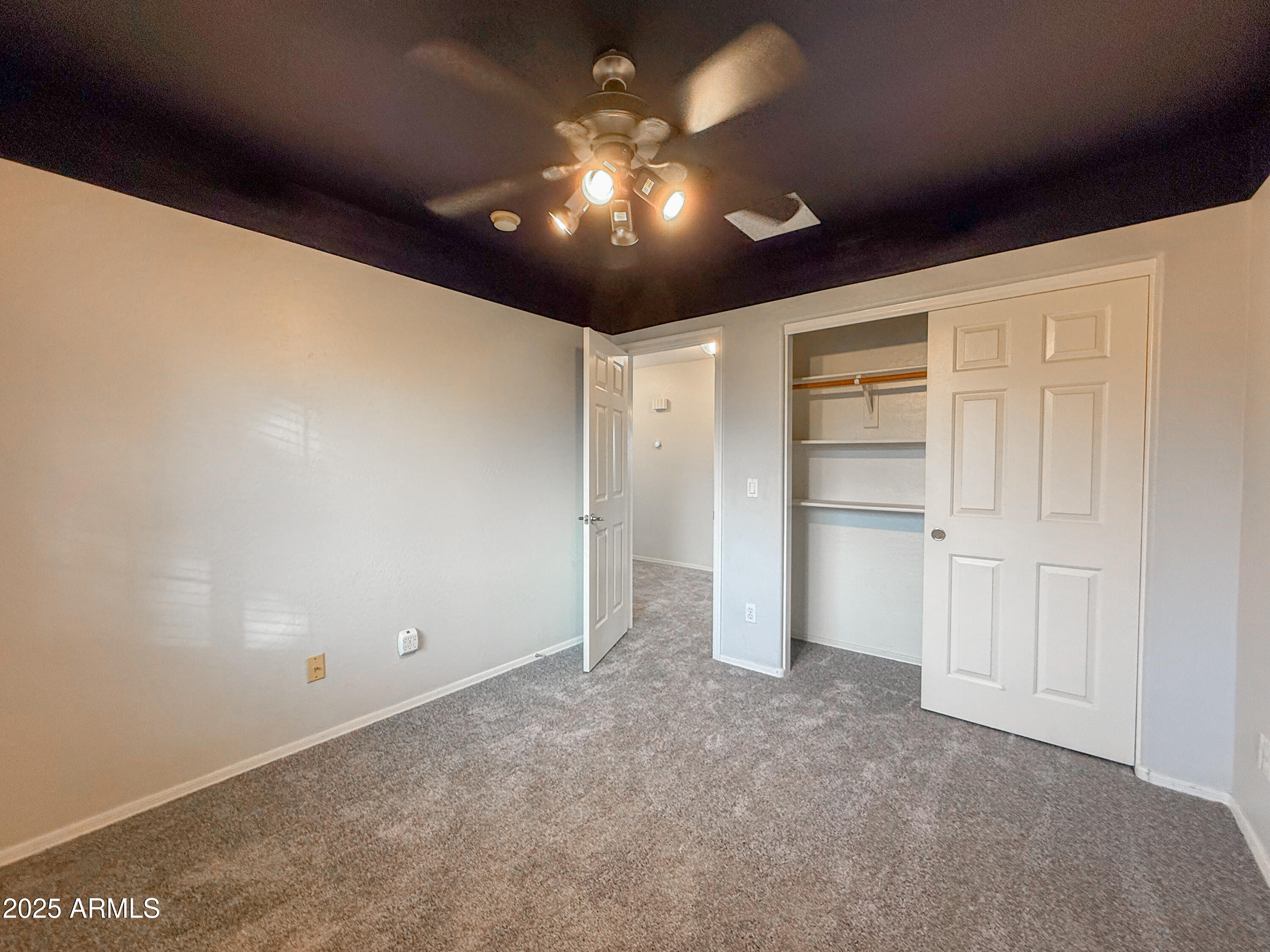 19716 East Thornton Road Queen Creek, AZ 85142 - Photo 33 of 62 a view of an empty room and a ceiling fan