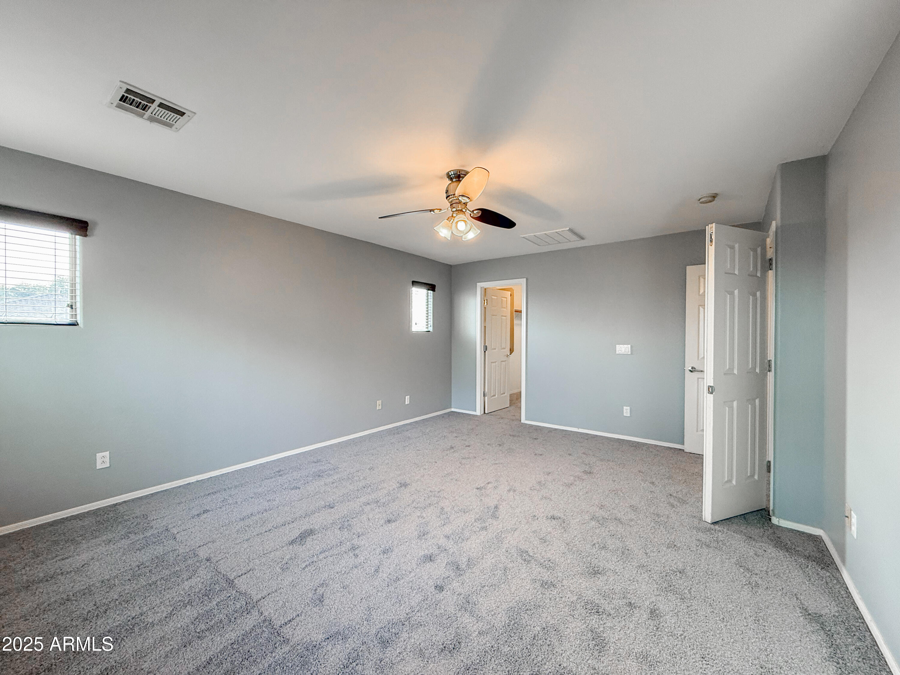 19716 East Thornton Road Queen Creek, AZ 85142 - Photo 36 of 62 a view of an empty room with a window