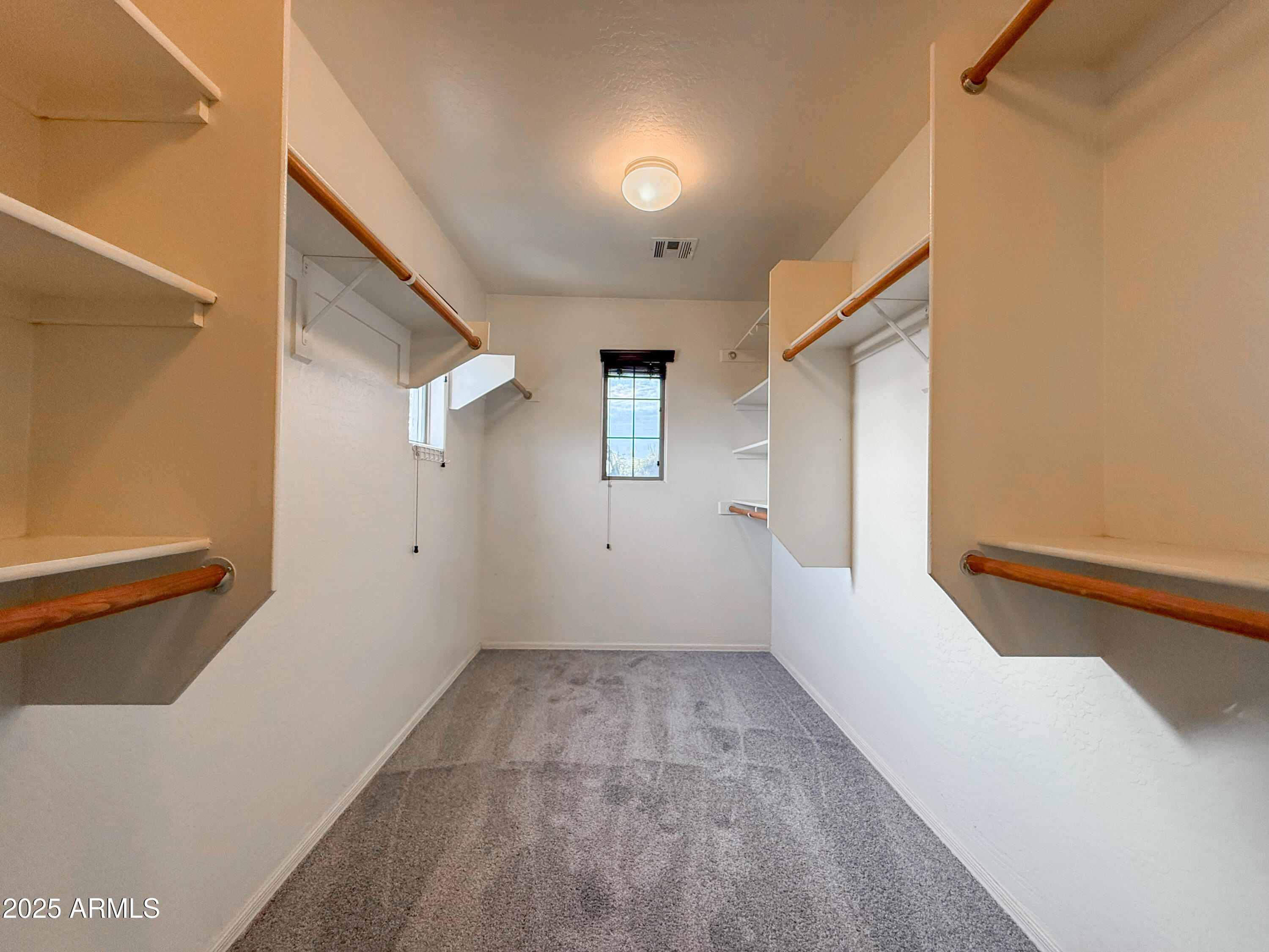 19716 East Thornton Road Queen Creek, AZ 85142 - Photo 37 of 62 a view of a hallway with wooden floor and staircase