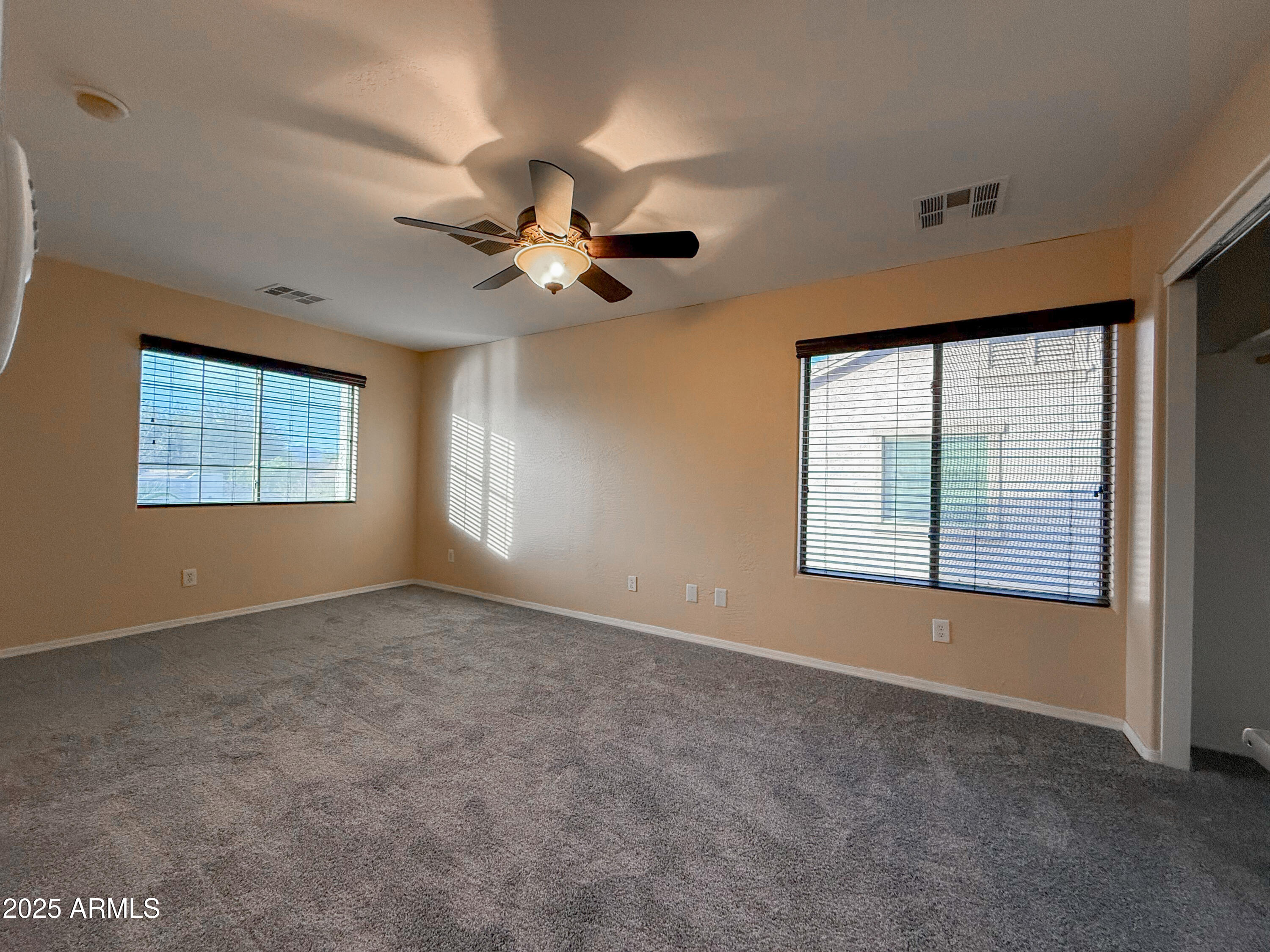 19716 East Thornton Road Queen Creek, AZ 85142 - Photo 42 of 62 a view of an empty room with a window
