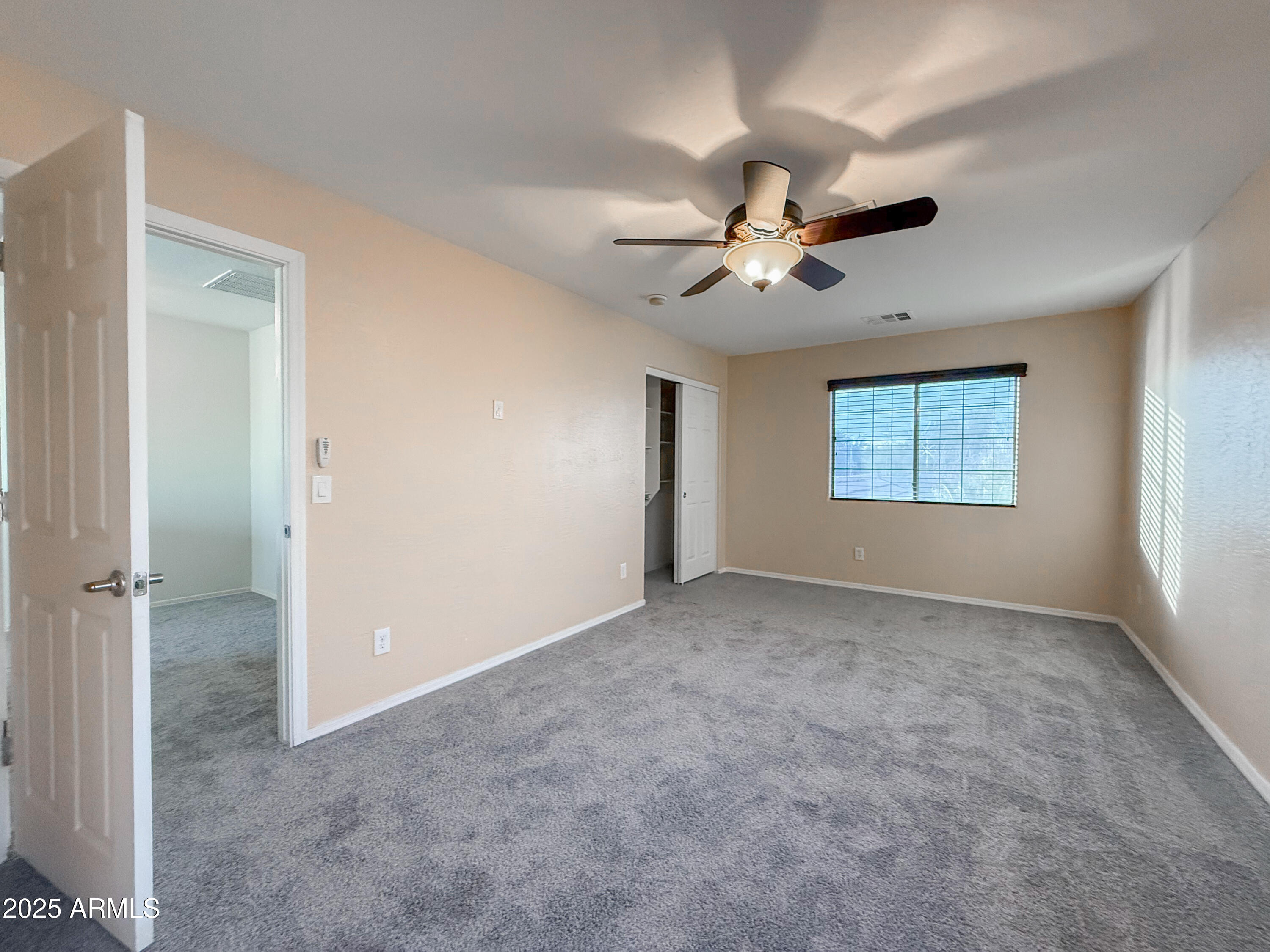 19716 East Thornton Road Queen Creek, AZ 85142 - Photo 43 of 62 a view of an empty room with a window