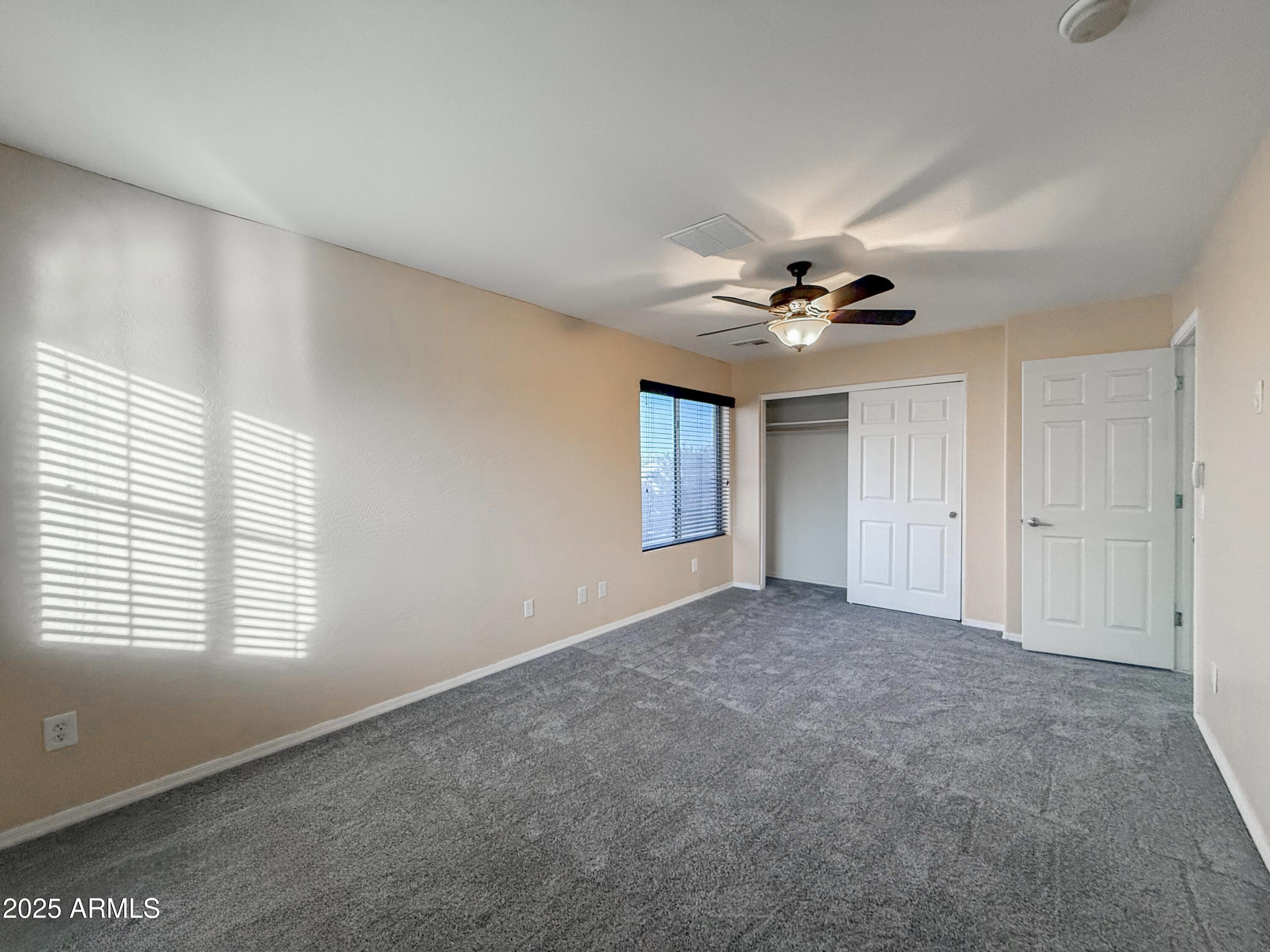 19716 East Thornton Road Queen Creek, AZ 85142 - Photo 44 of 62 a view of an empty room with a window