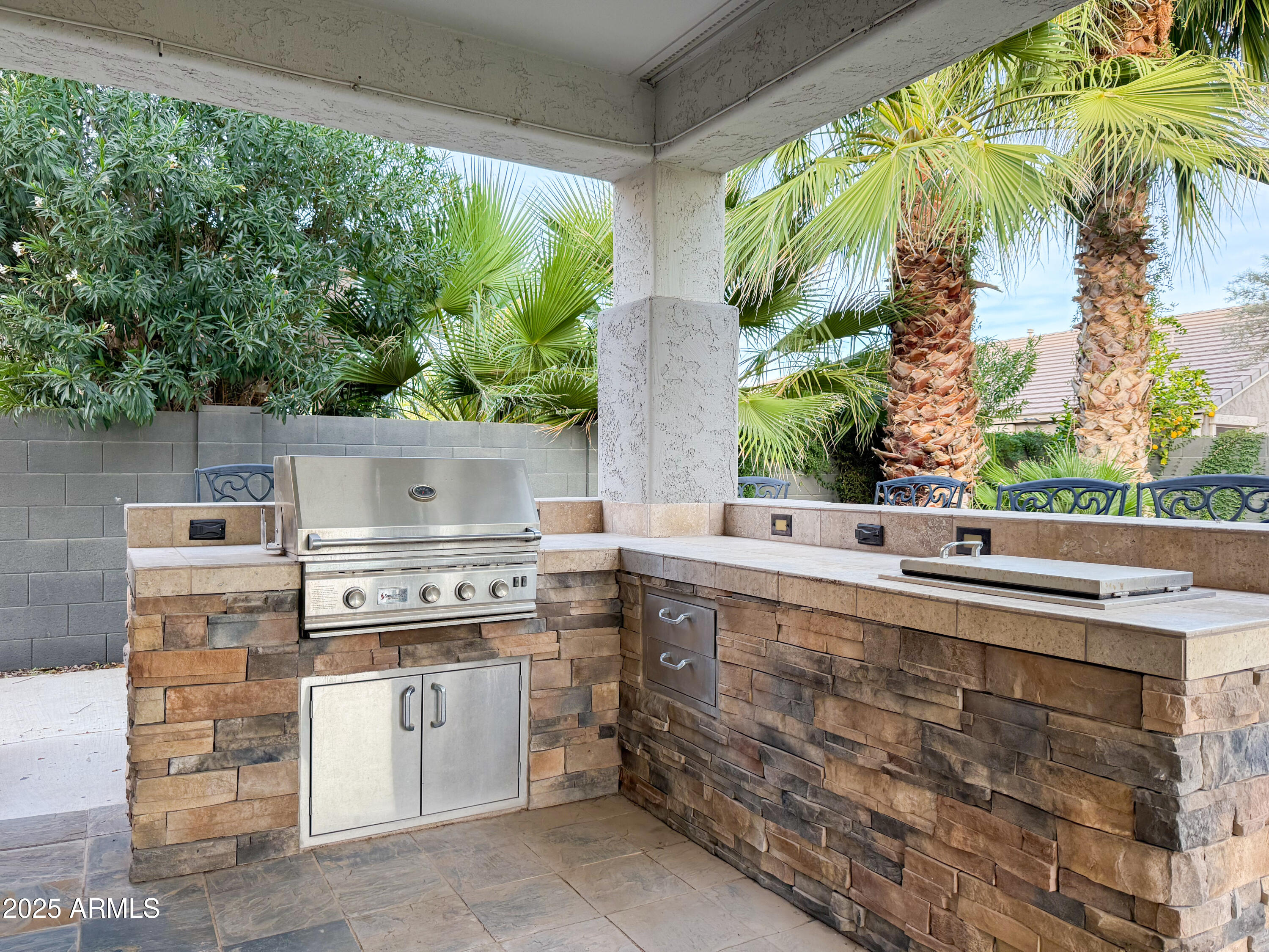 19716 East Thornton Road Queen Creek, AZ 85142 - Photo 48 of 62 a open kitchen with a stove and a white wooden cabinets