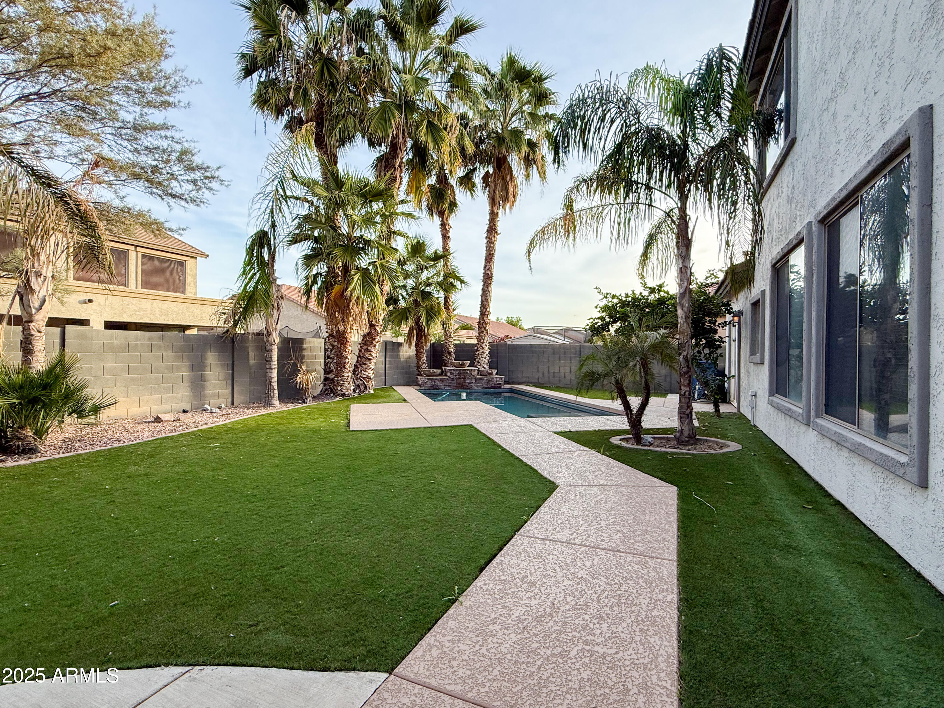 19716 East Thornton Road Queen Creek, AZ 85142 - Photo 49 of 62 a view of a backyard with a garden