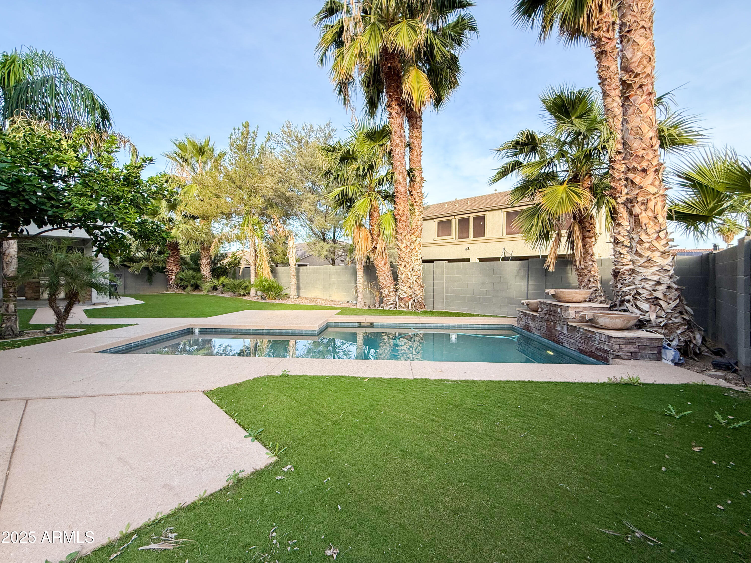 19716 East Thornton Road Queen Creek, AZ 85142 - Photo 52 of 62 a house with garden in front of it