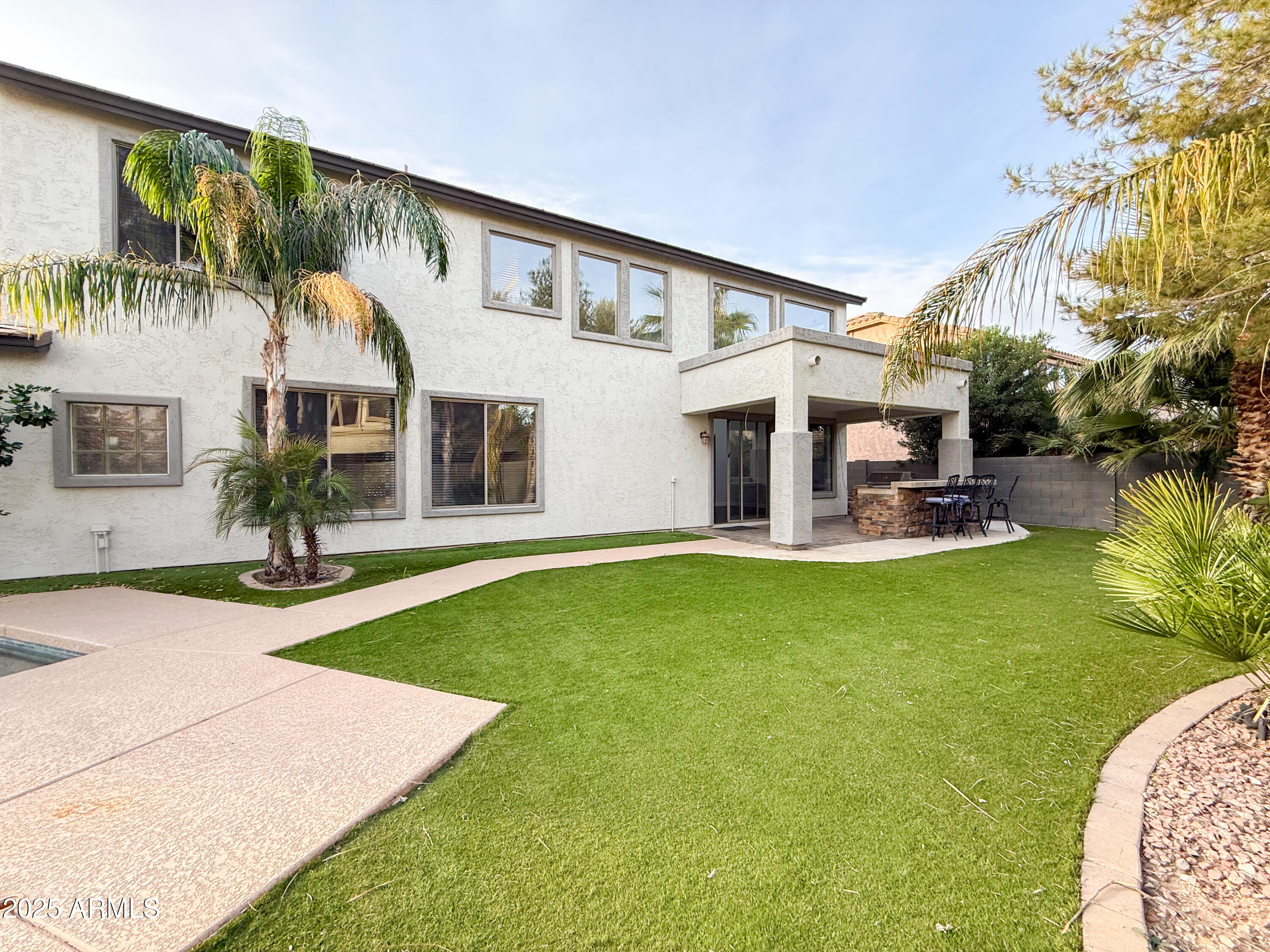 19716 East Thornton Road Queen Creek, AZ 85142 - Photo 54 of 62 a view of a house with a swimming pool