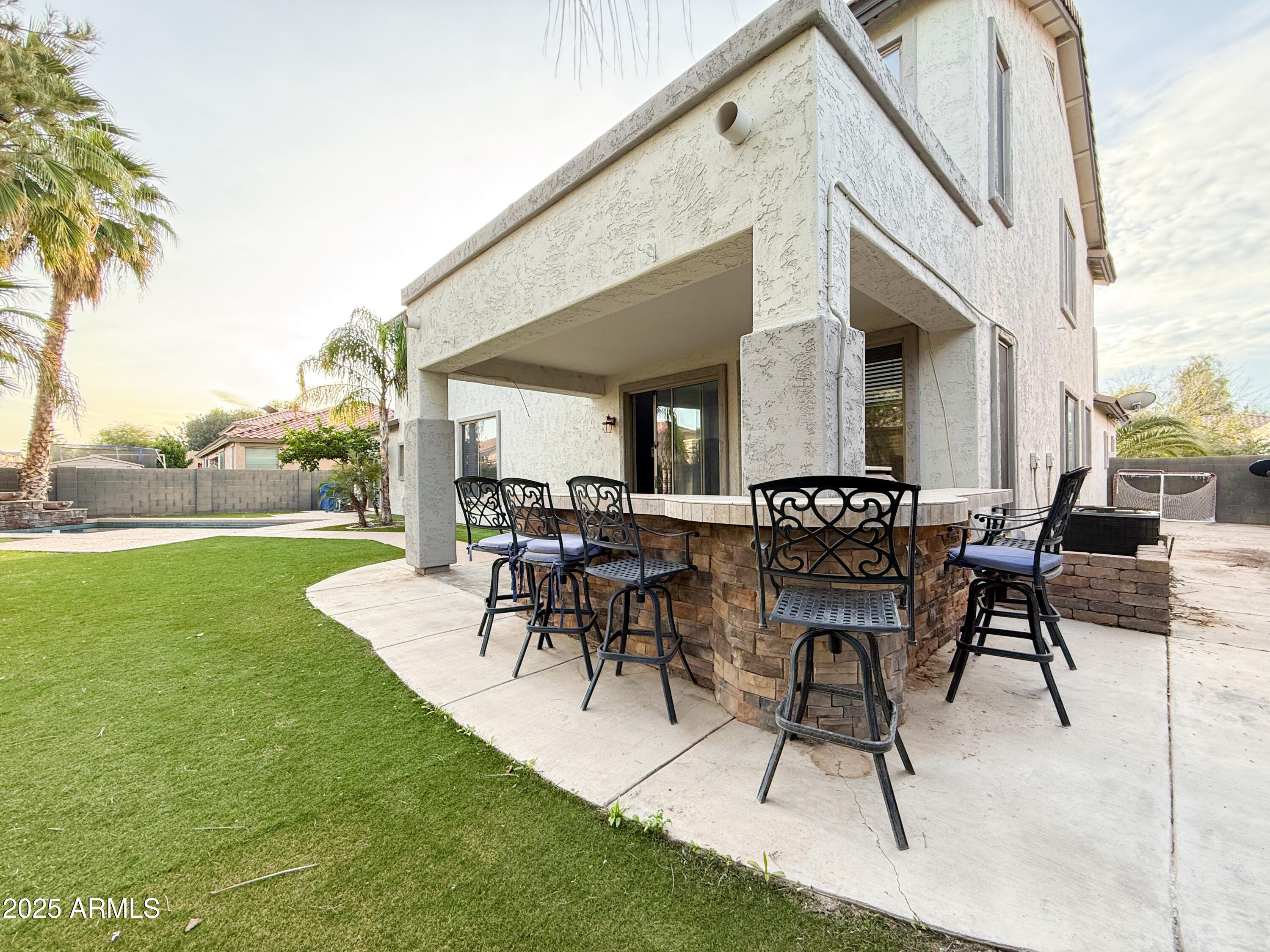 19716 East Thornton Road Queen Creek, AZ 85142 - Photo 56 of 62 a view of a house with a yard