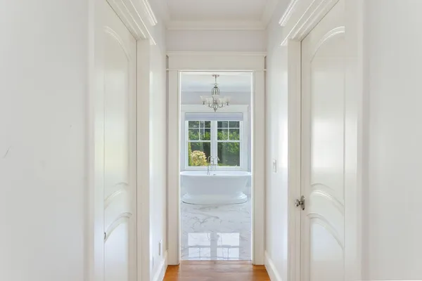 a view of a bathroom with a glass door