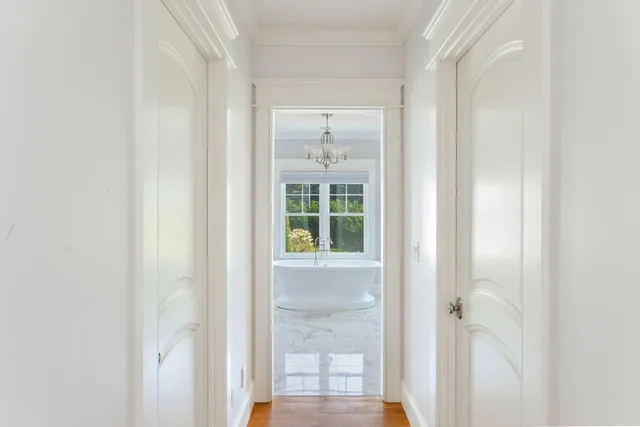 a view of a bathroom with a glass door