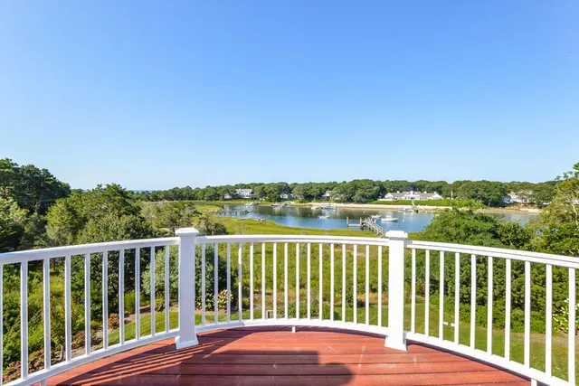 a view of a balcony with city view