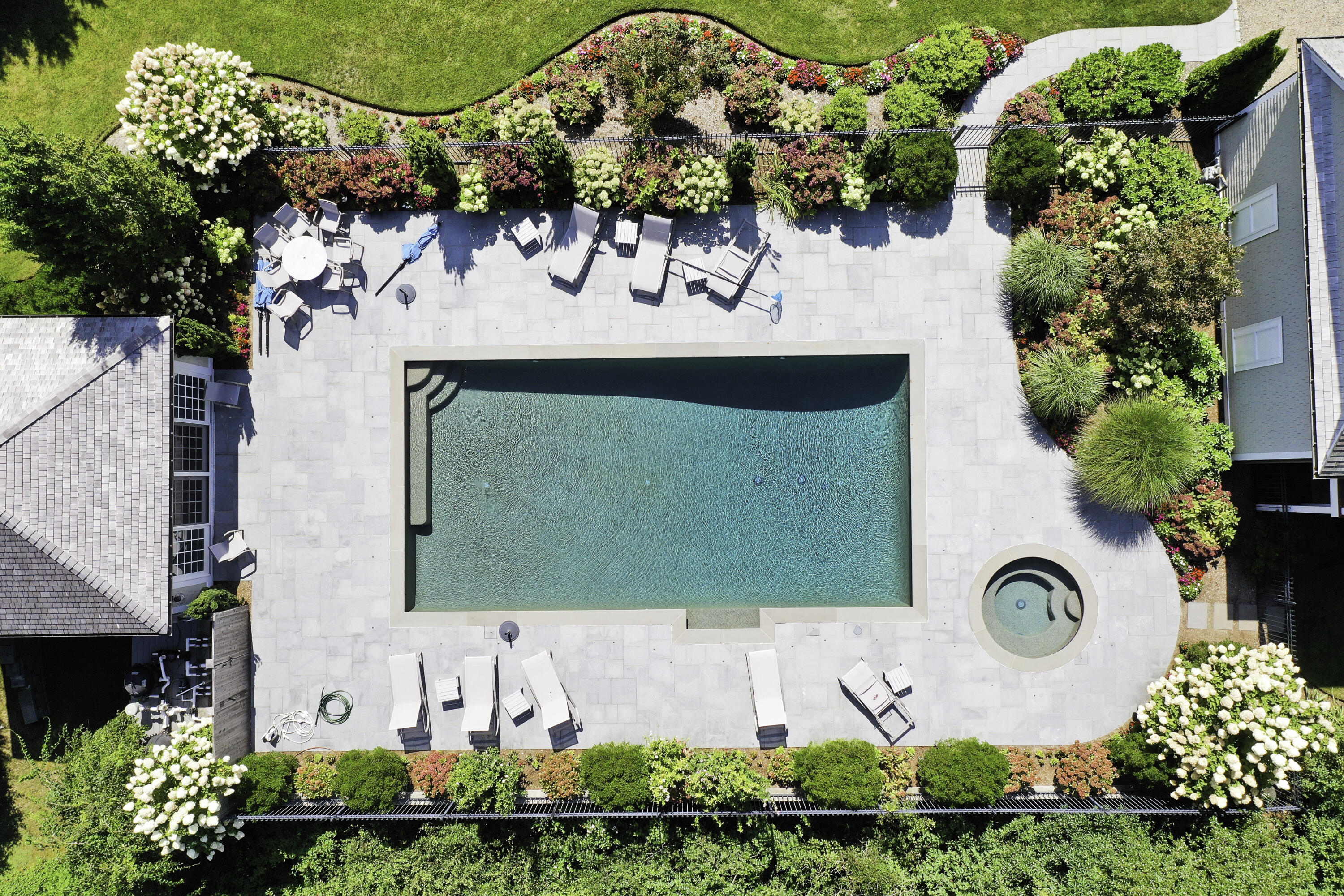 501 Eel River Road Osterville, MA 02655 - Photo 48 of 50 an aerial view of a house with garden space and a street view