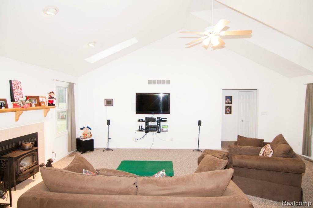 800 Jennings Road Whitmore Lake, MI 48189 - Photo 4 of 40 Living room with vaulted ceiling and skylights
