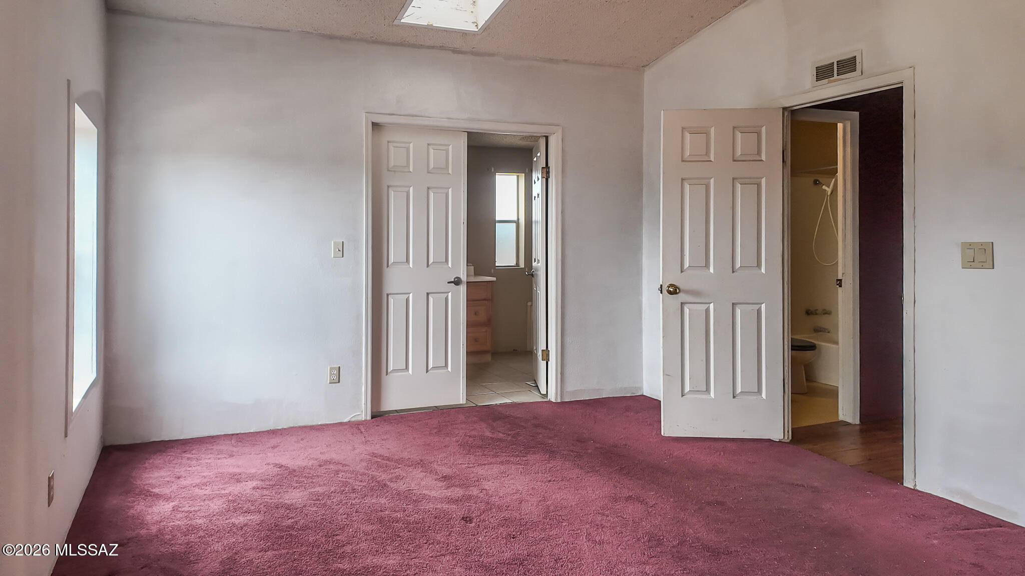 27651 South Canoa Road Amado, AZ 85645 - Photo 8 of 20 an empty room with windows and closet