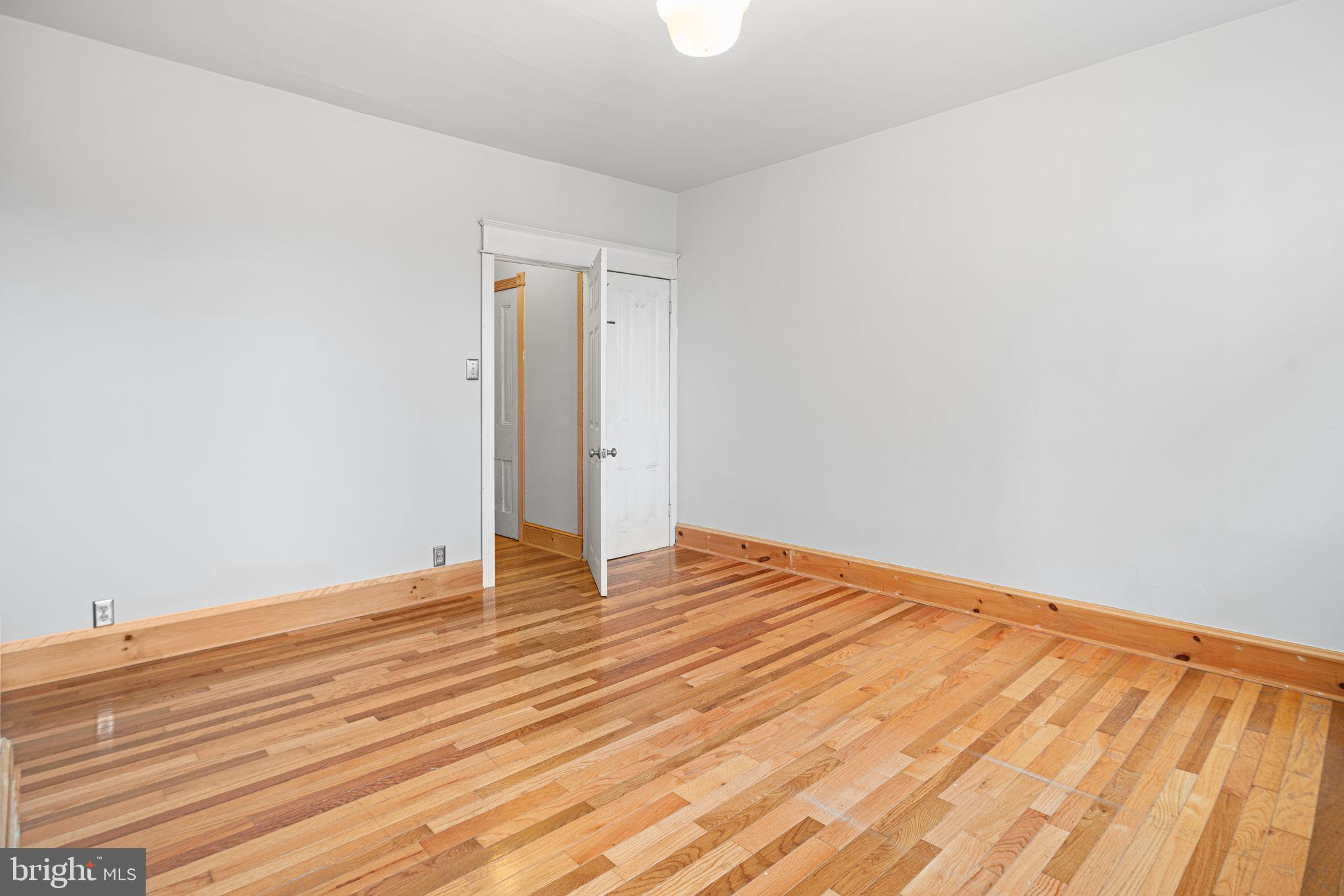 2142 East Huntingdon Street Philadelphia, PA 19125 - Photo 24 of 38 a view of an empty room with wooden floor