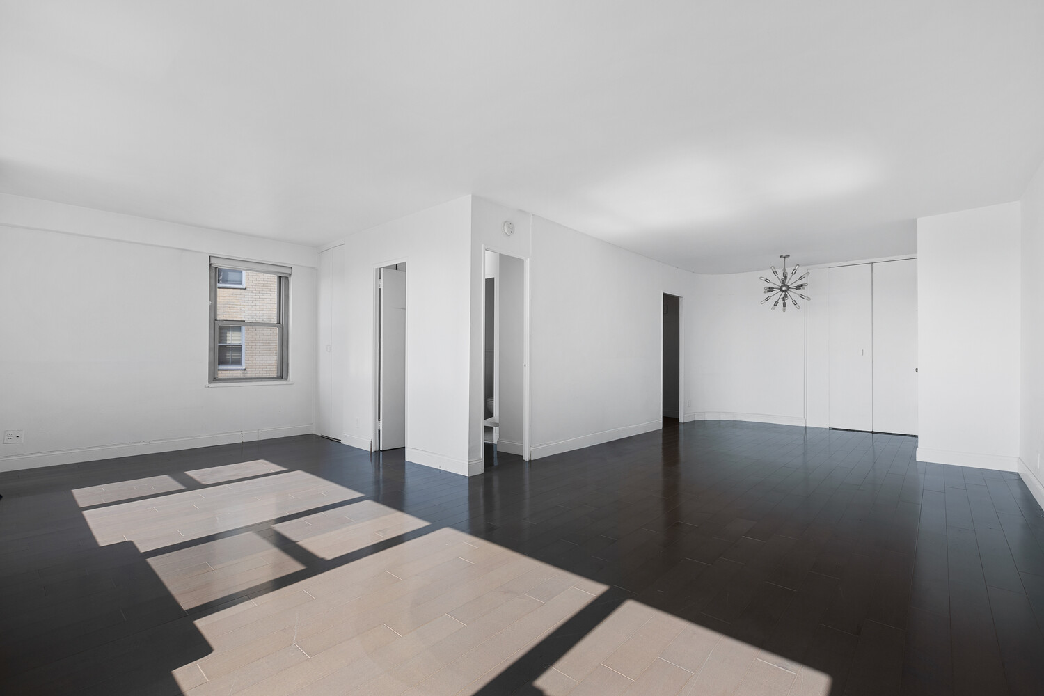 1020 Grand Concourse, Unit 20B Bronx, NY 10451 - Photo 6 of 10 a view of livingroom with hardwood floor and hallway